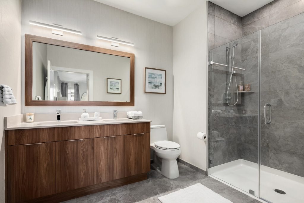 Bathroom with double vanity and shower.