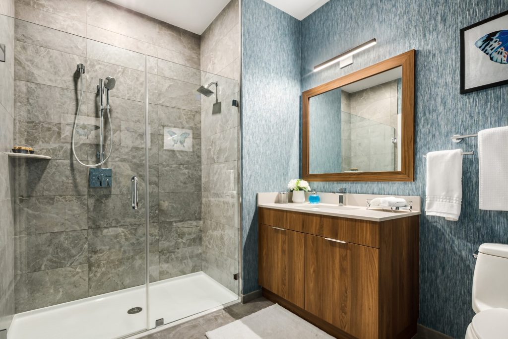 Bathroom with walk-in shower.